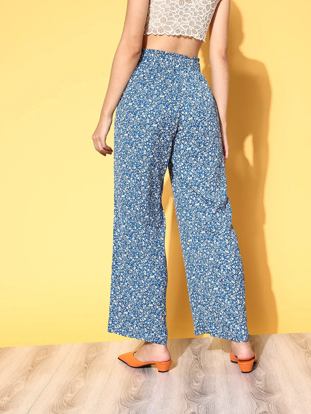 Berrylush Women Blue & White Floral Printed Loose Fit High-Rise Elastic Waist Pleated Trousers